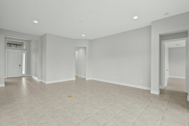 spare room with light tile patterned floors