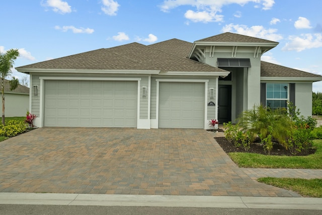 view of front of home with a garage