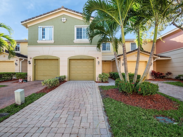 view of front of property featuring a garage