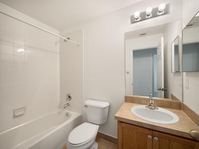 full bathroom featuring vanity, tile patterned floors, toilet, a textured ceiling, and shower / bathtub combination