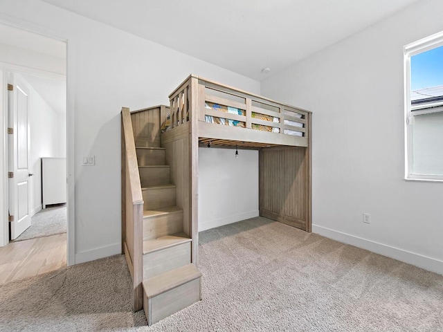 unfurnished bedroom featuring carpet