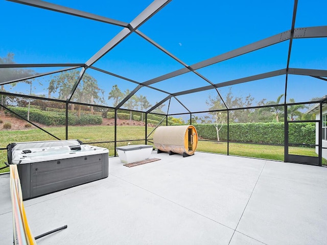 view of patio with glass enclosure