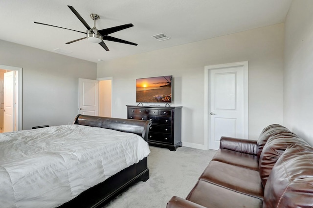 bedroom featuring ceiling fan and light colored carpet