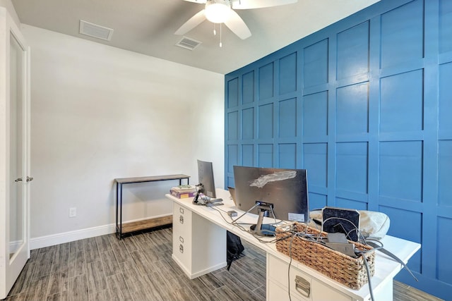 office featuring ceiling fan and light hardwood / wood-style floors