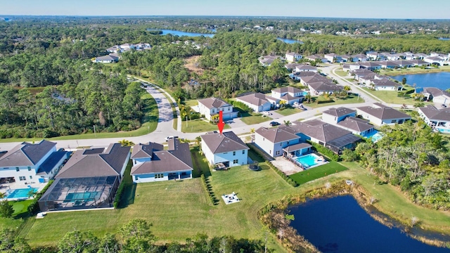 birds eye view of property featuring a water view