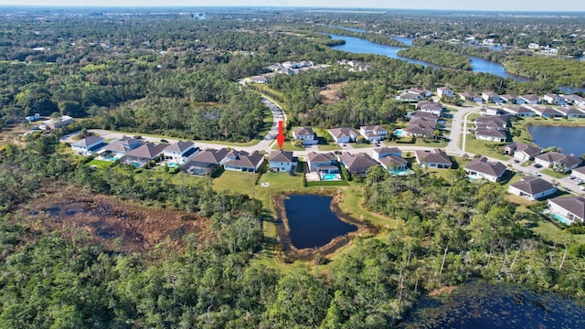 drone / aerial view with a water view