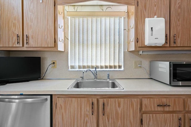 kitchen featuring appliances with stainless steel finishes and sink