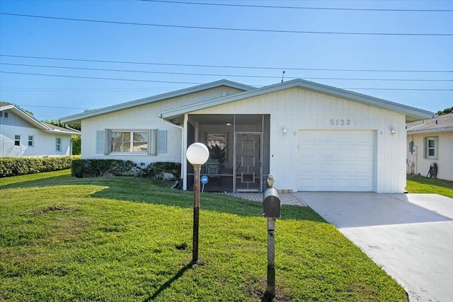 single story home with a front yard, a garage, and a sunroom