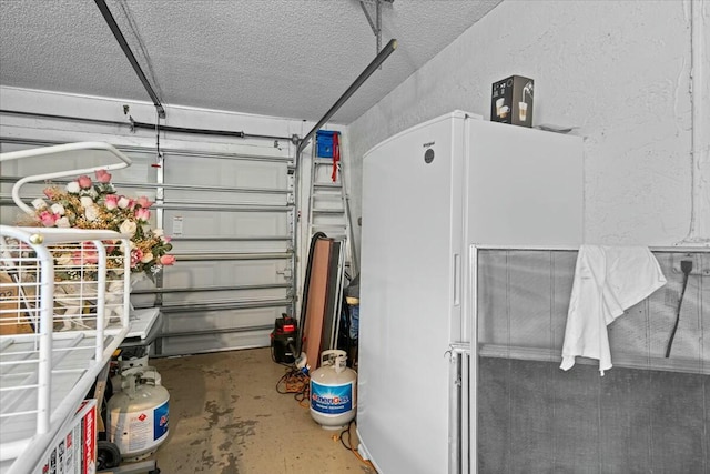 garage with white fridge