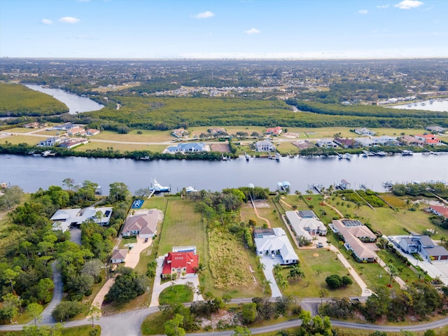 2861 SE S Lookout Blvd, Port Saint Lucie, FL 34984 - aerial overview of property's location featuring a nearby body of water and nearby suburban area