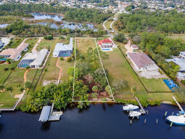 2861 SE S Lookout Blvd, Port Saint Lucie, FL 34984 - aerial view of property's location featuring a large body of water and property boundaries highlighted