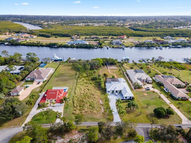2861 SE S Lookout Blvd, Port Saint Lucie, FL 34984 - aerial view of property's location with a large body of water and nearby suburban area