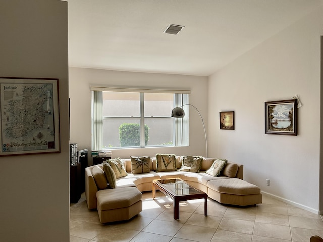 living room with light tile patterned floors