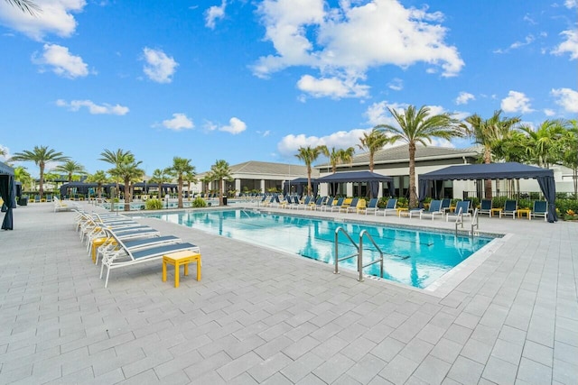 view of pool featuring a gazebo and a patio