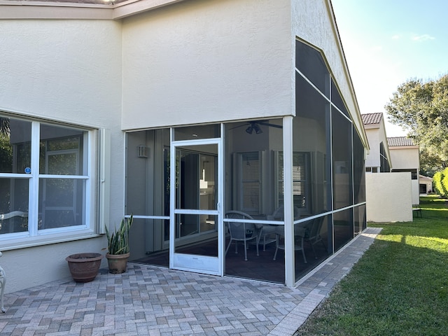 rear view of house with a patio area and a yard