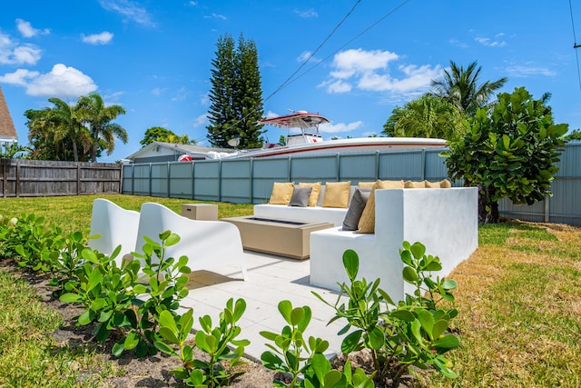 view of patio / terrace with a fenced backyard and outdoor lounge area