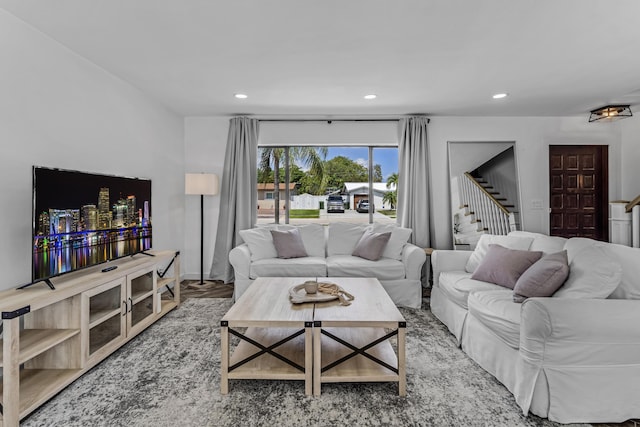 living room with recessed lighting and stairs