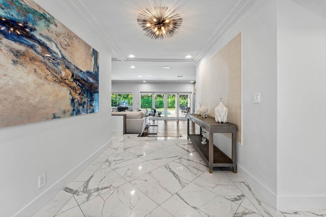 hallway featuring crown molding and french doors