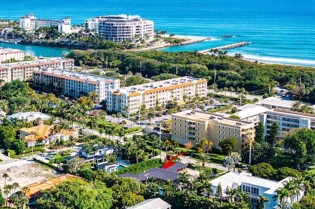 aerial view featuring a water view and a view of the beach