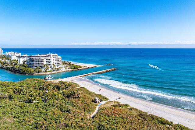 aerial view featuring a view of the beach and a water view