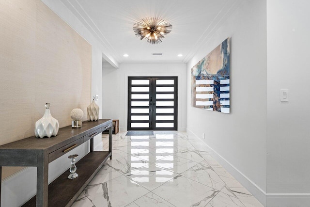 doorway with french doors and crown molding