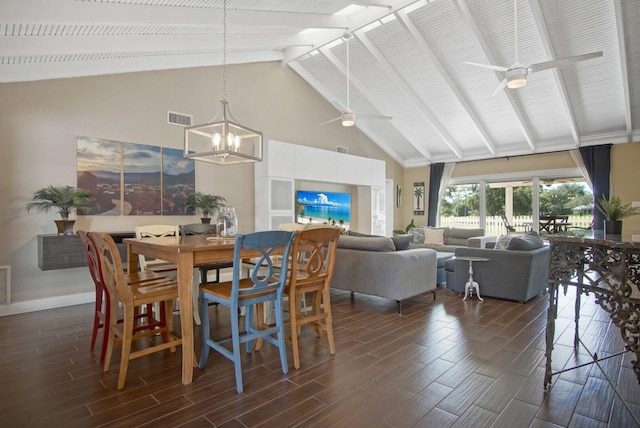 dining room featuring beamed ceiling, ceiling fan with notable chandelier, and high vaulted ceiling