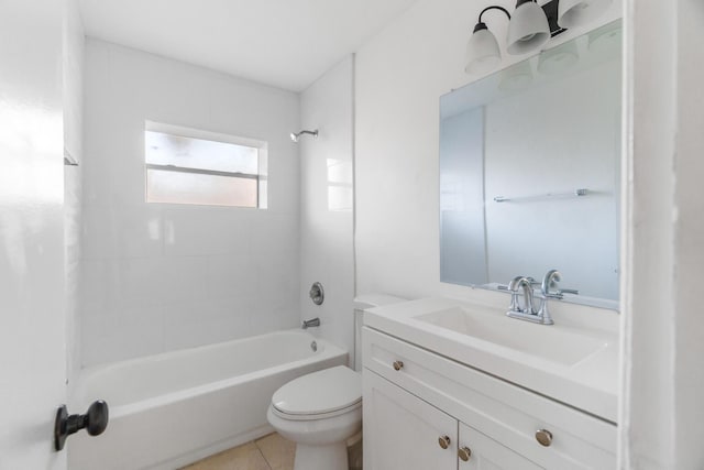 full bathroom featuring tile patterned flooring, vanity, tiled shower / bath combo, and toilet