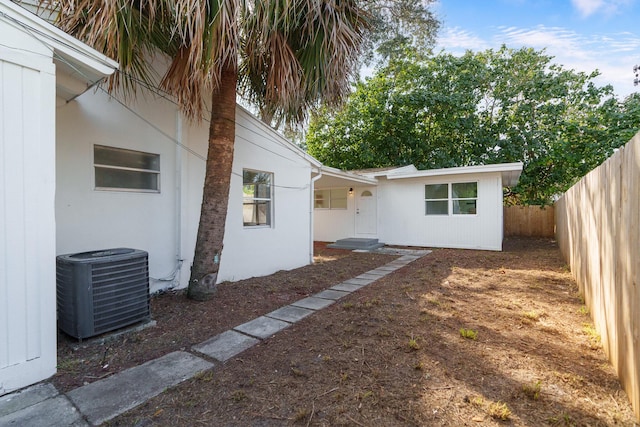 view of home's exterior with central AC unit