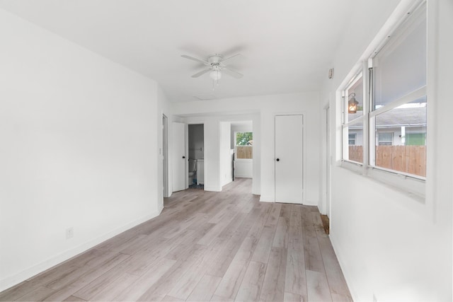 spare room with ceiling fan and light hardwood / wood-style floors