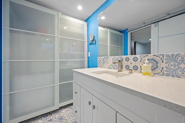 bathroom with backsplash and vanity