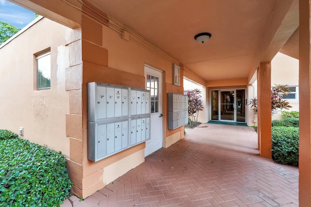 view of home's community with mail boxes