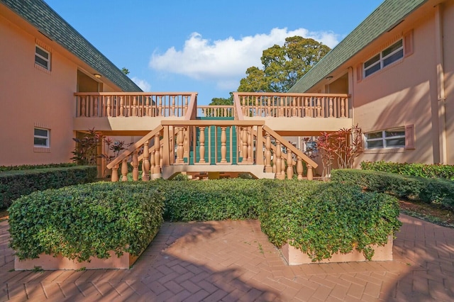760 SE 2nd Ave Unit C203, Deerfield Beach, FL 33441 - view of patio featuring stairs and a wooden deck