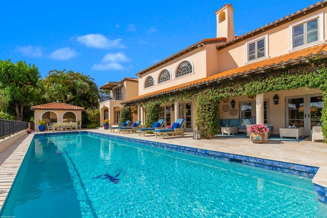 view of pool with a gazebo and a patio