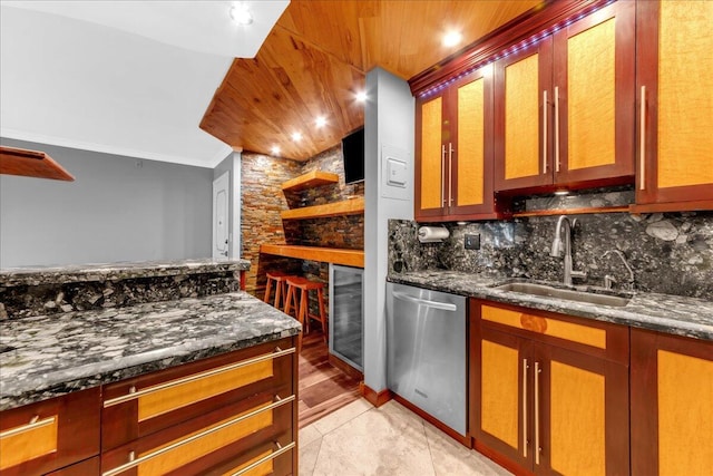 kitchen with dishwasher, sink, beverage cooler, and dark stone countertops