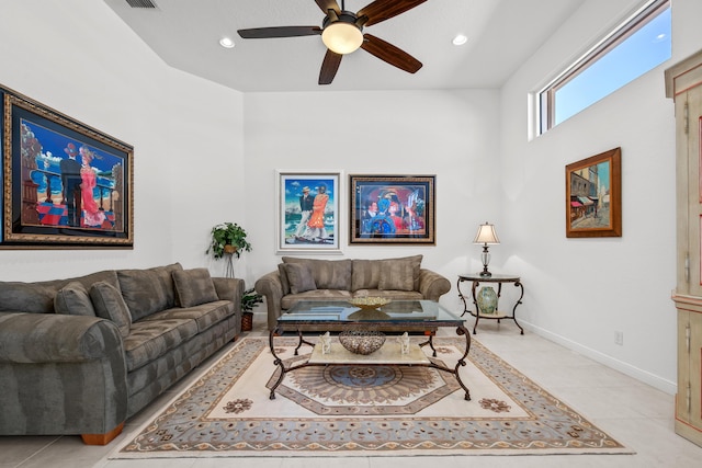 tiled living room featuring ceiling fan