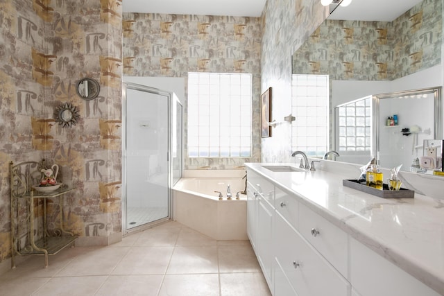 bathroom with vanity, separate shower and tub, and tile patterned floors