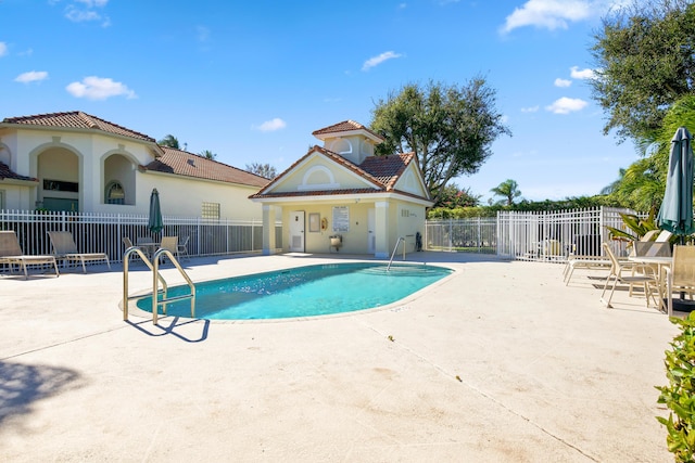 view of pool featuring a patio area