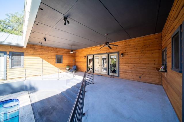 view of patio / terrace featuring french doors and ceiling fan