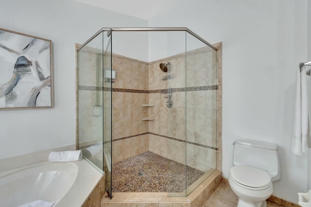 bathroom featuring tile patterned flooring, plus walk in shower, and toilet