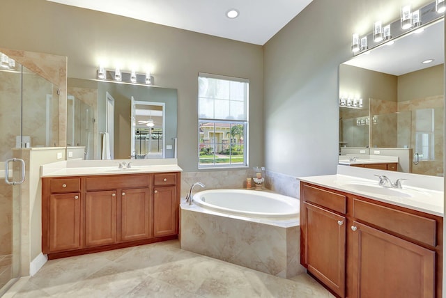 bathroom featuring plus walk in shower and vanity