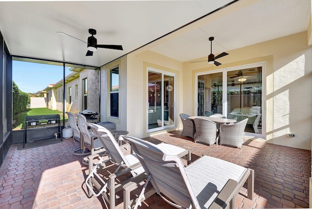 view of patio / terrace featuring ceiling fan