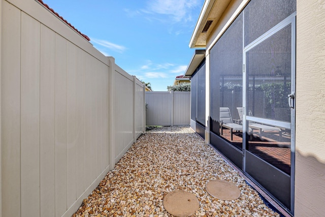 view of yard with a sunroom