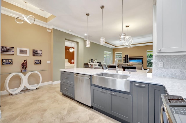 kitchen featuring hanging light fixtures, dishwasher, sink, and ornamental molding