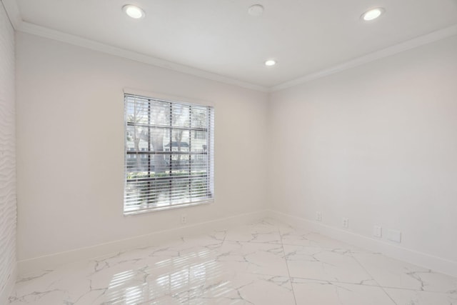 unfurnished room featuring ornamental molding