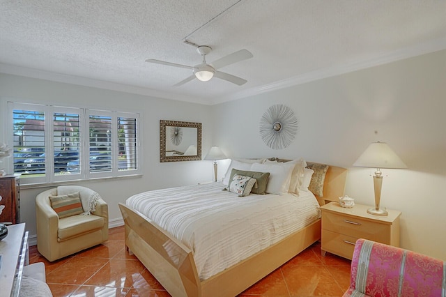 tiled bedroom featuring ceiling fan, crown molding, and a textured ceiling