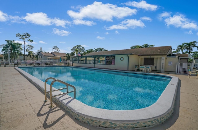 view of swimming pool featuring a patio