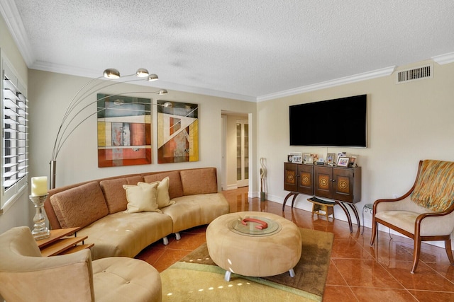 living room featuring tile patterned flooring, crown molding, and a textured ceiling