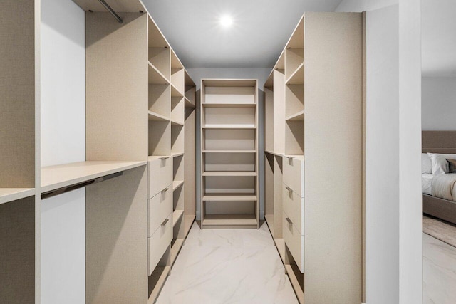 1338 SW 13th St, Boca Raton, FL 33486 - walk in closet featuring light marble finish flooring
