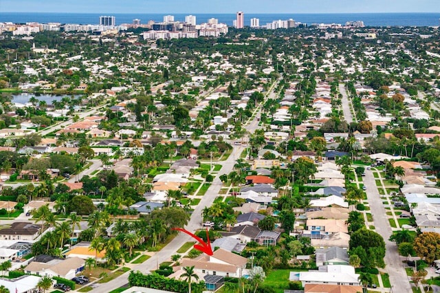 aerial view with a water view and a residential view