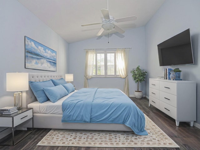 bedroom featuring ceiling fan, lofted ceiling, and dark wood-type flooring